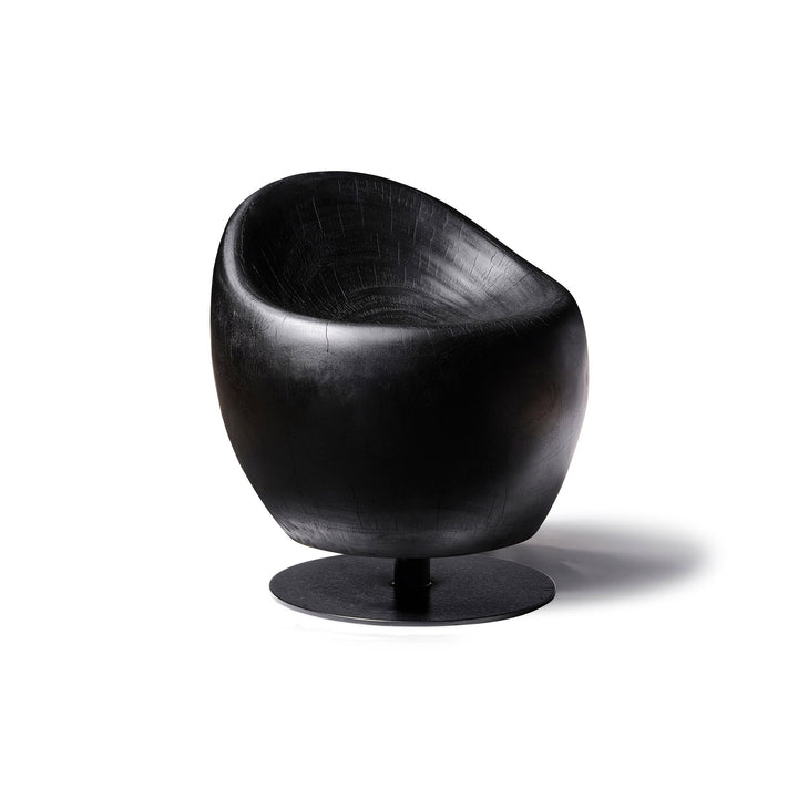 Meuble type petit fauteuil au forme arrondie en bois de suar massif brule noir avec pied metal rotatif noir